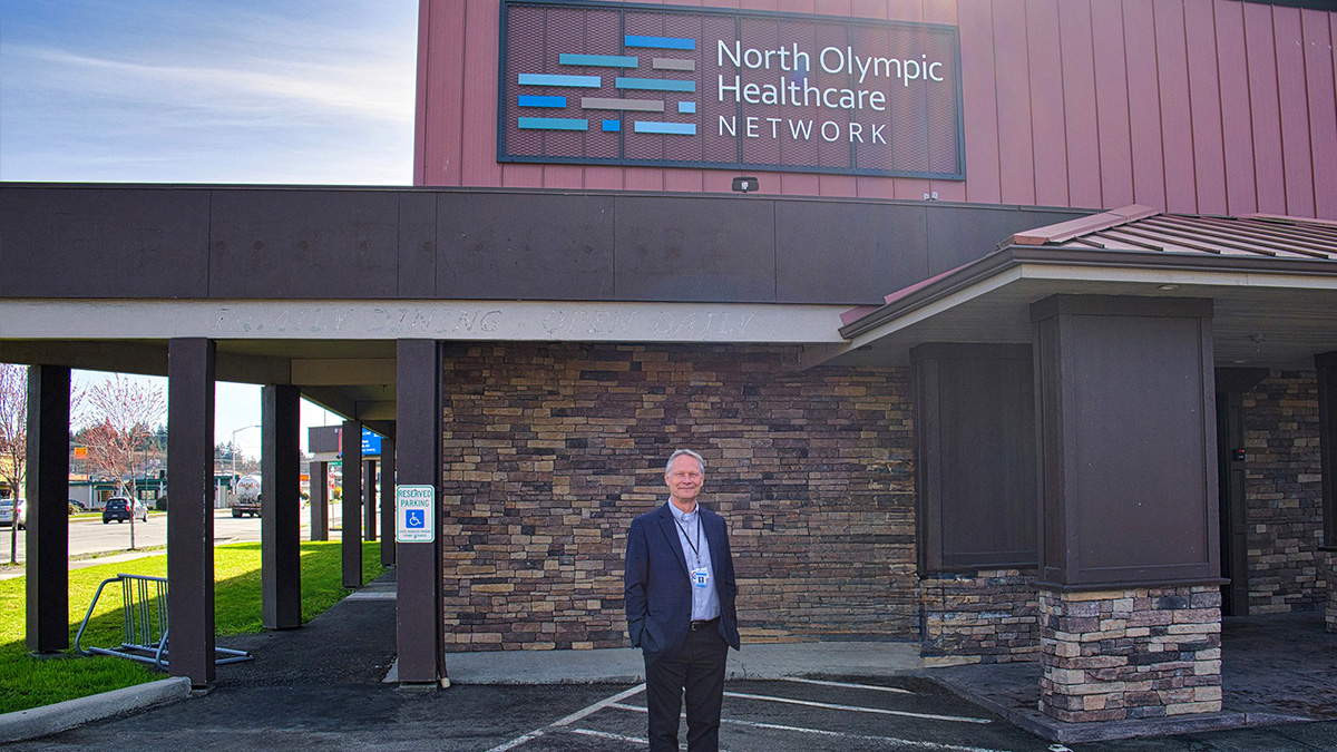 North Olympic Healthcare Network Dr. Maxwell in front of NOHN